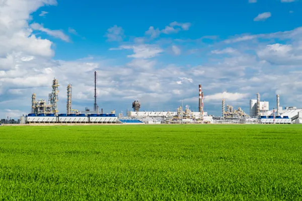 Green field with energy plant