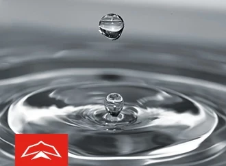 Water droplets with overlaid RedRaven logo