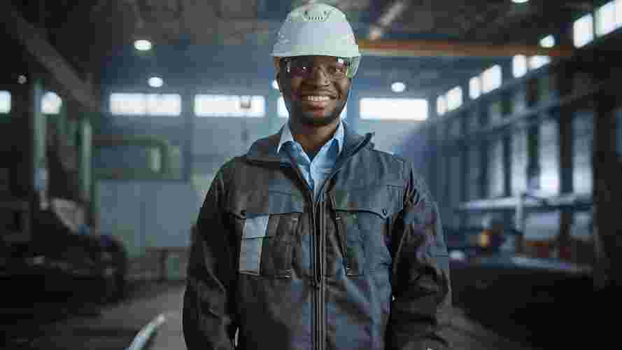 Smiling worker in hard hat