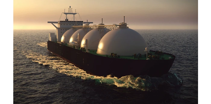 A special ocean vessel carrying liquefied natural gas in four domed containers.