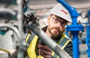 Man servicing a Limitorque Actuator