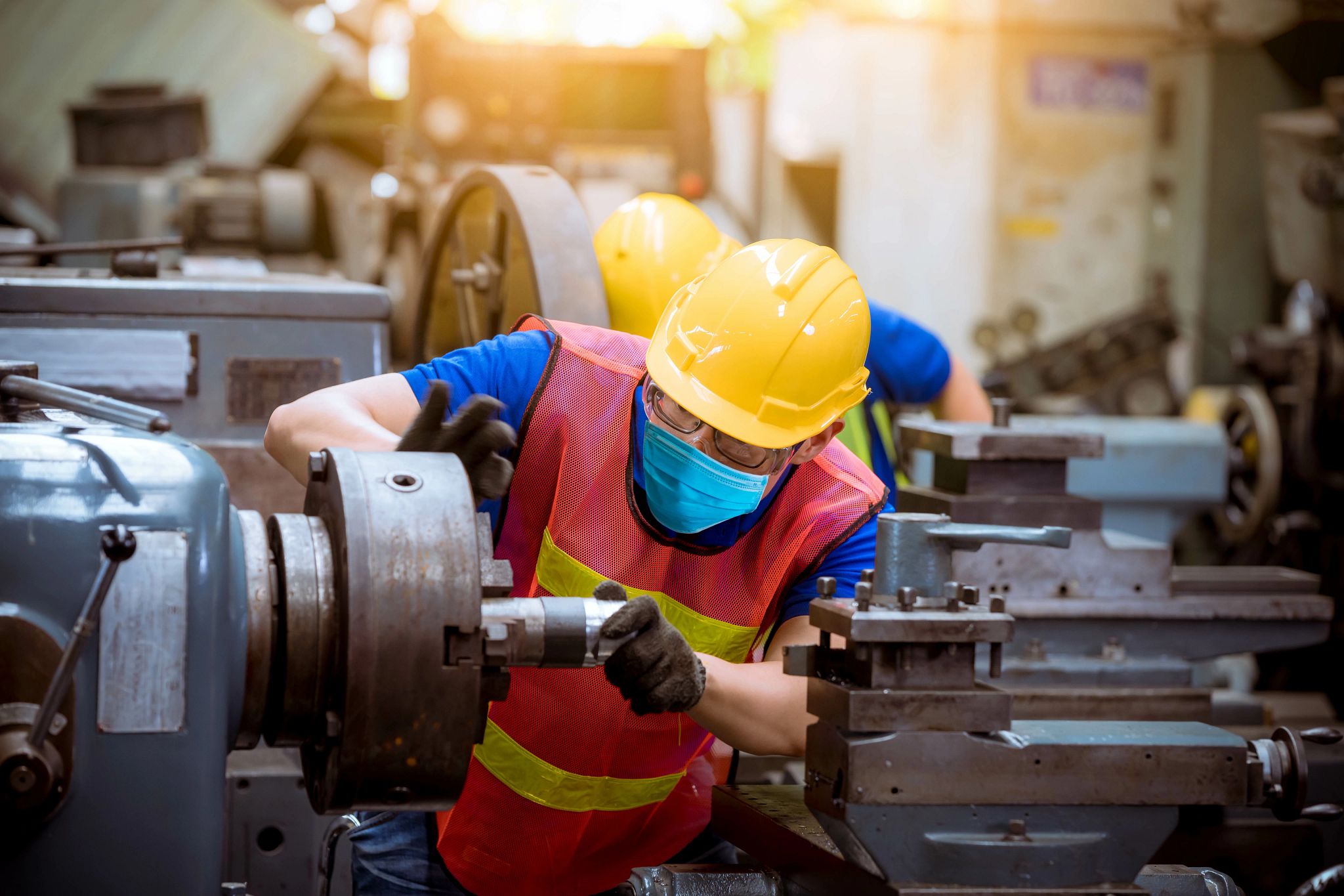 Man with hard hat adjusting a seal image